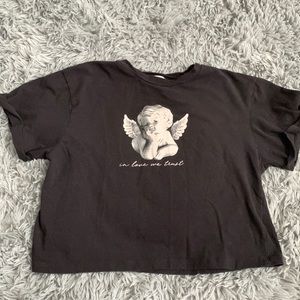 Black “In Love We Trust” angel shirt